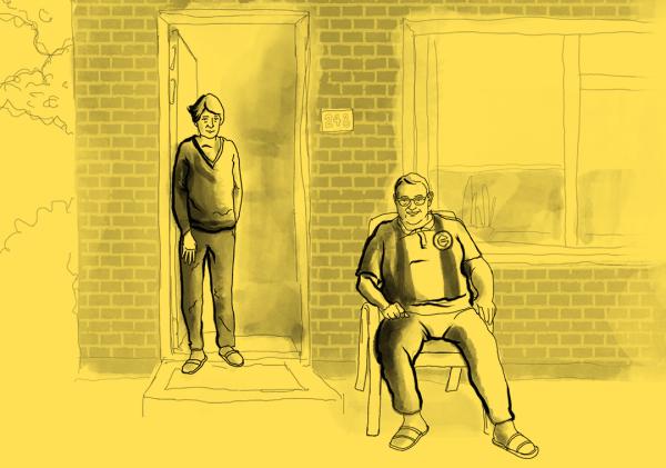 Man en vrouw staan voor hun huis.